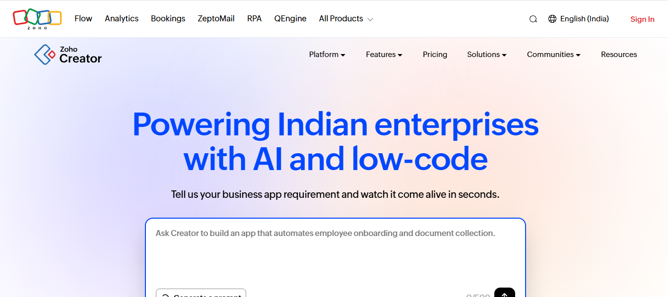 Zoho Creator low-code platform homepage focused on AI-driven application development for Indian enterprises, featuring a prompt-based app builder, modern gradient design, and messaging about automating business processes quickly using low-code tools